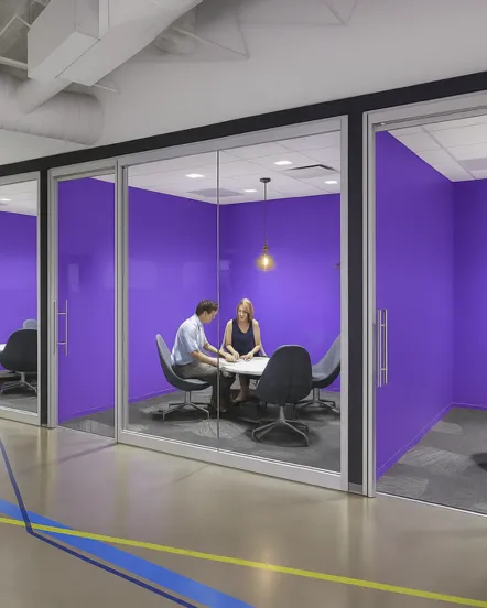 Huddle room AV setup with collaborative display and conferencing equipment